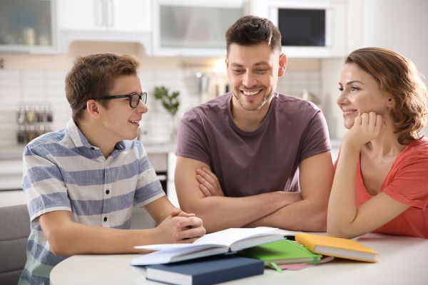 family and child are happy about a special school for autism