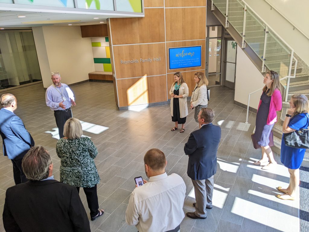 A group of people standing in a room